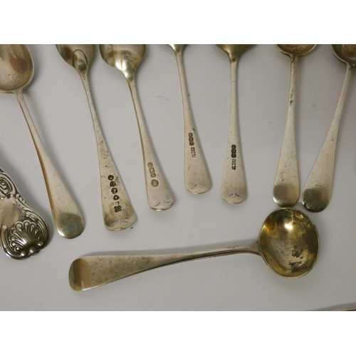 409 - A collection of antique and later silver spoons and a pair of Victorian silver sugar nips 8.9 troy o... 