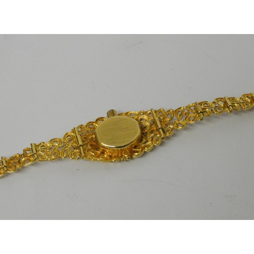 421 - Rotary 9ct yellow gold bracelet wristwatch, with original certificate dated 1971, gross weight 18.6g