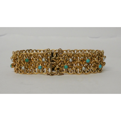 447 - A wide 9ct gold flexible link panel bracelet set with turquoise cabochons and seed pearls, clasp hal... 