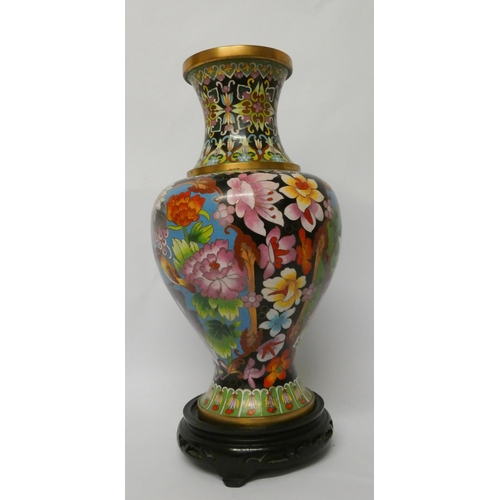 201 - A polychrome Chinese cloisonné enamelled vase on stand, 37cms tall including the base