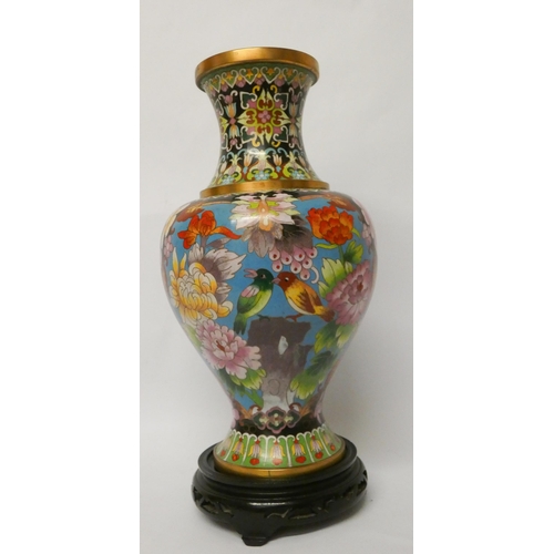 201 - A polychrome Chinese cloisonné enamelled vase on stand, 37cms tall including the base