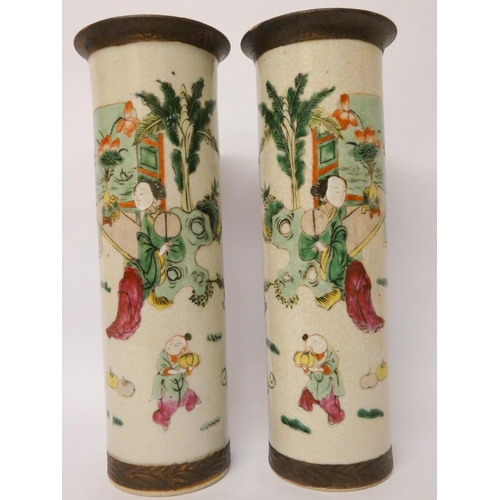 203 - A pair of Japanese crackle ware cylindrical vases, character marks on the base, height 31cms tall