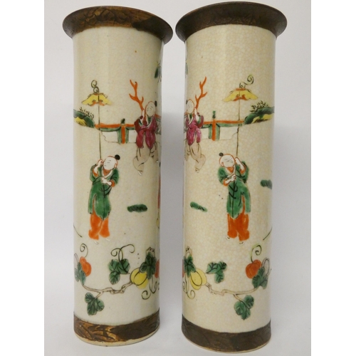 203 - A pair of Japanese crackle ware cylindrical vases, character marks on the base, height 31cms tall