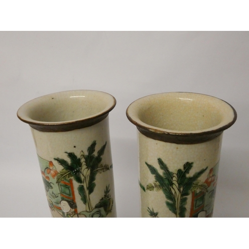 203 - A pair of Japanese crackle ware cylindrical vases, character marks on the base, height 31cms tall