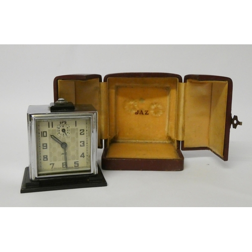 225 - An Art Deco Jaz travelling clock in fitted leather case