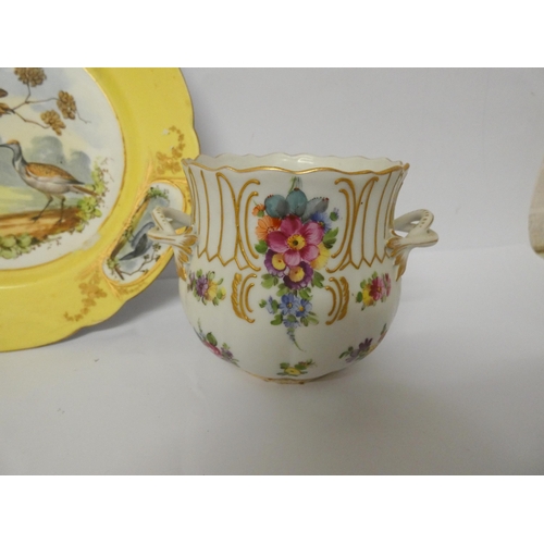 232 - A bird decorated French porcelain plate, two Staffordshire pastille burners and a Dresden twin handl... 