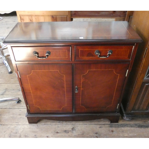 149 - A reproduction mahogany hall cabinet fitted two drawers and cupboards, 2'6 wide