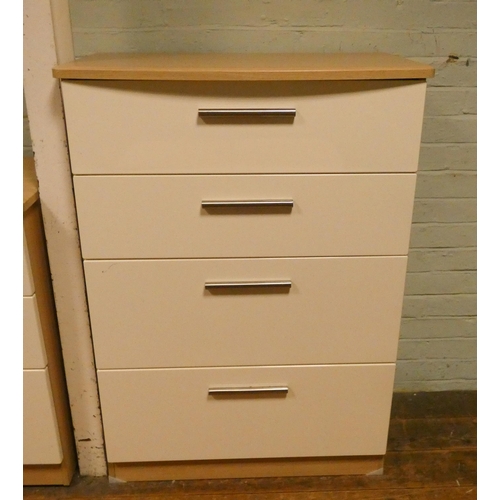 182 - A modern cream and light oak finished chest of four long drawers and a pair of matching three drawer... 