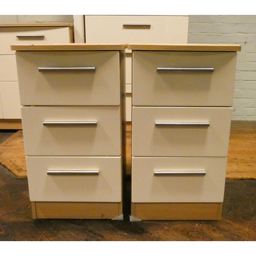 182 - A modern cream and light oak finished chest of four long drawers and a pair of matching three drawer... 