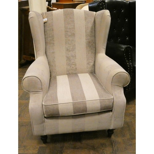 287 - A modern easy chair in cream and brown stripped material