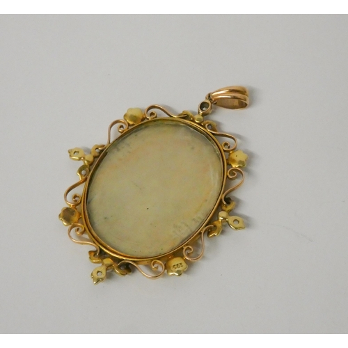 445 - An antique 15ct gold oval locket, the centre with portrait miniature of a 19th century gentleman, wi... 