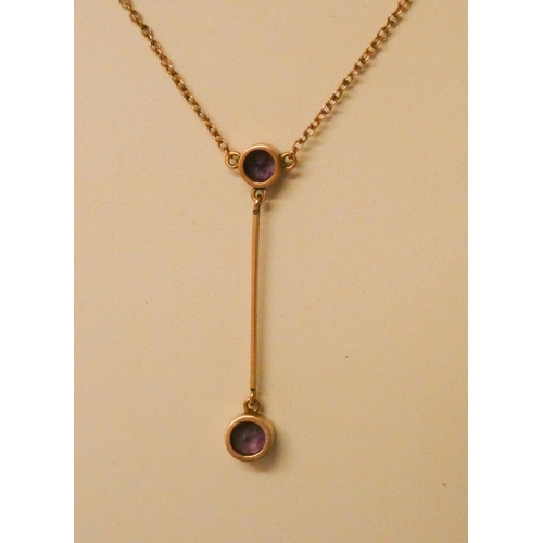 451 - Edwardian 9ct rose gold and amethyst pendant necklace, clasp marked '9ct'