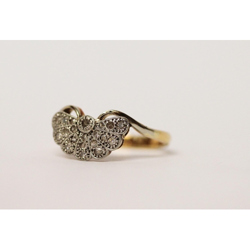 454 - An Edwardian diamond fan shaped cluster ring, on marked 18ct gold and platinum band, ring size O, gr... 