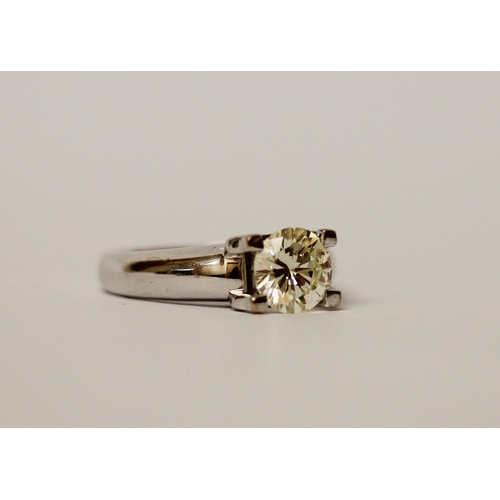 484 - A large solitaire diamond ring, the circular claw set  brilliant cut diamond weighing 1.5 carats app... 