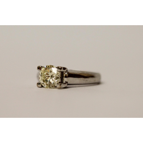 484 - A large solitaire diamond ring, the circular claw set  brilliant cut diamond weighing 1.5 carats app... 