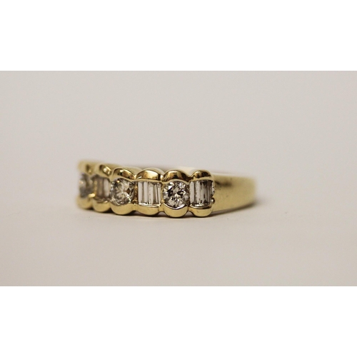 501 - A diamond half hoop ring, set alternate brilliant and baguette cut diamonds, in 14ct yellow gold, ri... 