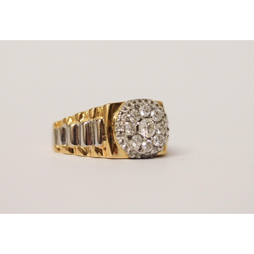 541 - A diamond ring, in bi-colour gold in the Rolex style, with central circular cluster of diamonds, unm... 