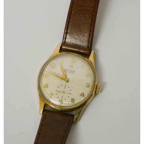 563 - Rolex - A gentleman's 1960's 9ct gold Rolex Precision manual wind wrist watch on brown leather strap