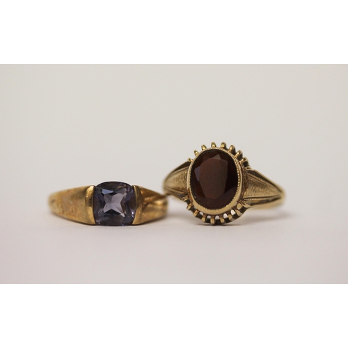 477 - 9ct yellow gold single stone tanzanite ring, size M and a single stone garnet ring on 9ct gold band,... 