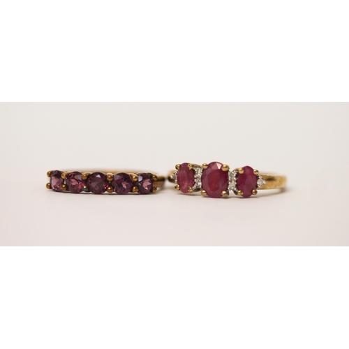 494 - A 9ct gold ruby and diamond ring and an amethyst five stone 9ct gold ring, both ring size M, gross w... 