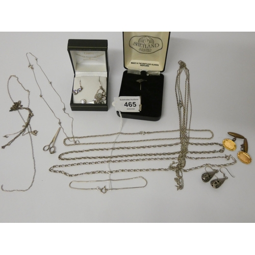 465 - A quantity of silver chain necklaces, silver and paste set earrings and pendant set, gilt metal cuff... 