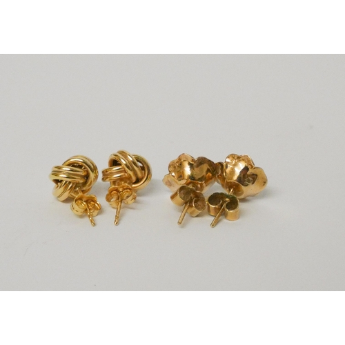 471 - A pair of 9ct gold knot stud earrings and a floral pair of gold stud earrings. Gross weight 5.7g