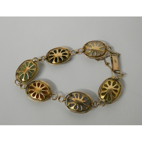 489 - A 14ct gold bracelet, cage set with assorted hardstones, with box clasp and safety chain, marked 14K... 