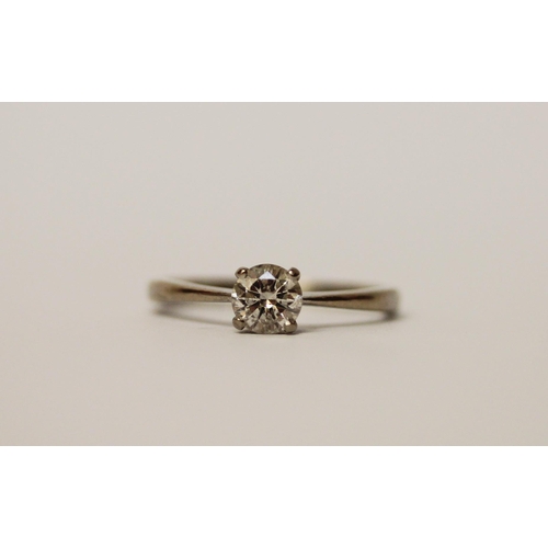 512 - A solitaire diamond ring, claw set with a brilliant cut circular diamond weighing 0.5 carats, on 18c... 