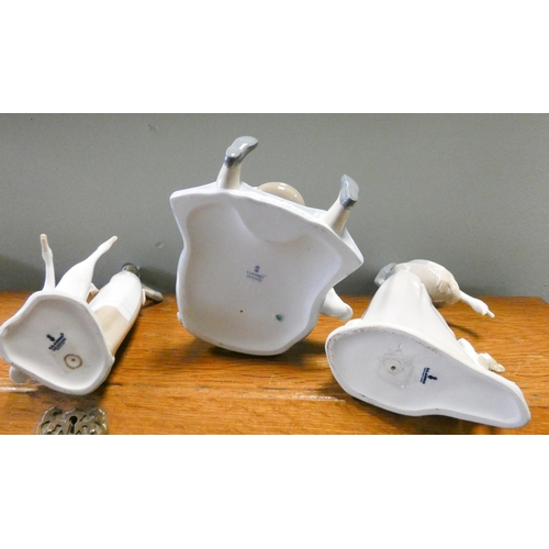 211 - Three Lladro figurines of ladies with geese