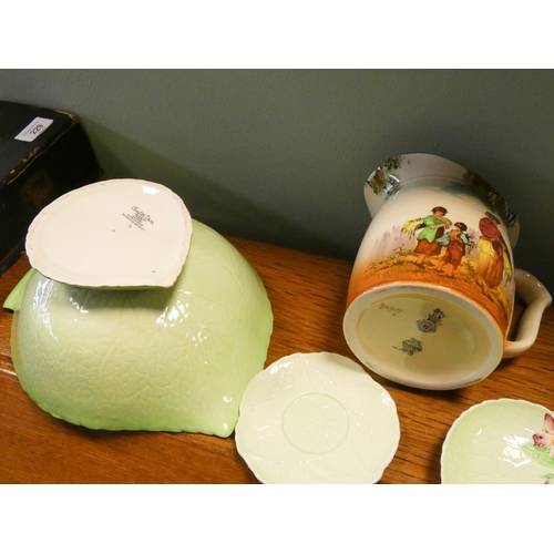 214 - A Doulton series ware jug, a Carlton ware leaf moulded salad bowl and plates