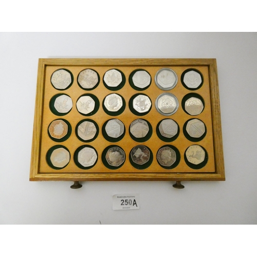 250A - An interesting collection of 50 pence coins, dates ranging from 1969 - 2010, many proof specimens, T... 