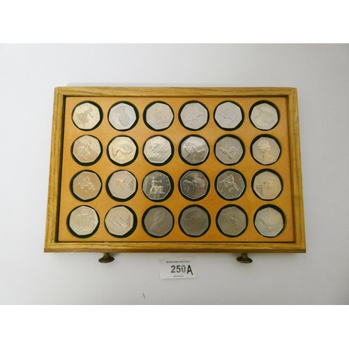 250A - An interesting collection of 50 pence coins, dates ranging from 1969 - 2010, many proof specimens, T... 