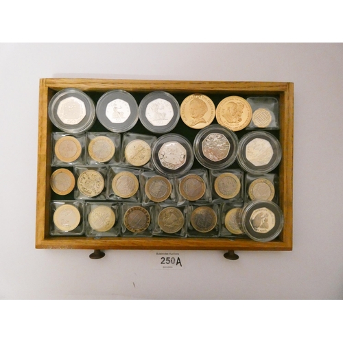 250A - An interesting collection of 50 pence coins, dates ranging from 1969 - 2010, many proof specimens, T... 