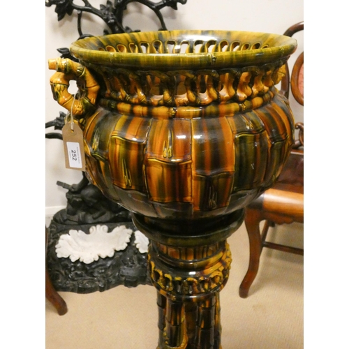 252 - French Chinoiserie Majolica jardinière on cluster column base, in ochre and brown drip glazes.