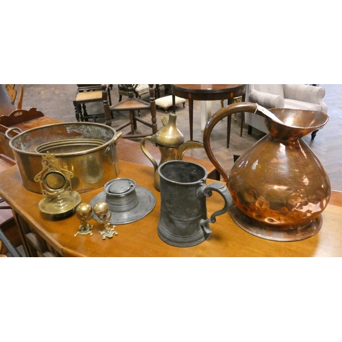 296 - A copper flagon, brass oval saucepan with various pewter and brass ware