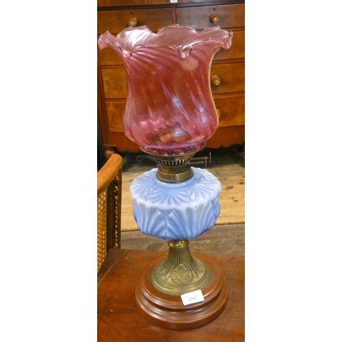 300 - Victorian oil lamp with cranberry glass shade and blue glass reservoir