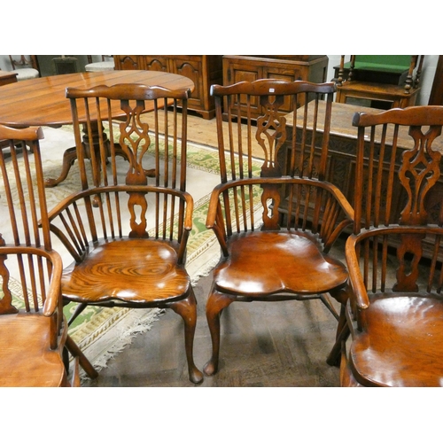 395 - Set of six 20th century antique style Windsor arm chairs, with pierced vase shaped splats and cross ... 