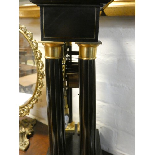 221 - A late 19th century Portico clock