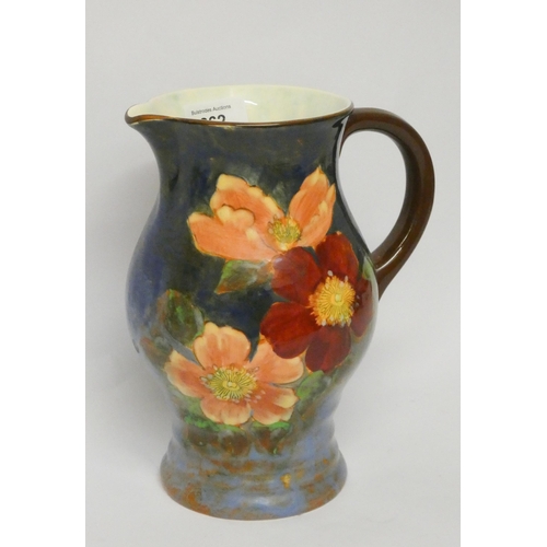 262 - A Royal Doulton jug painted with wild roses, D6227