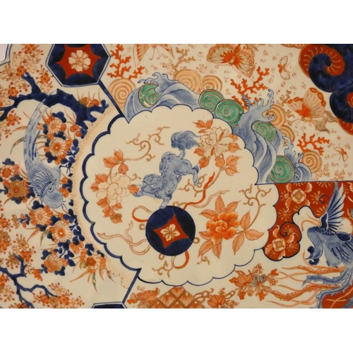 265 - A very large Imari wall charger with scalloped edge, 22 1/2