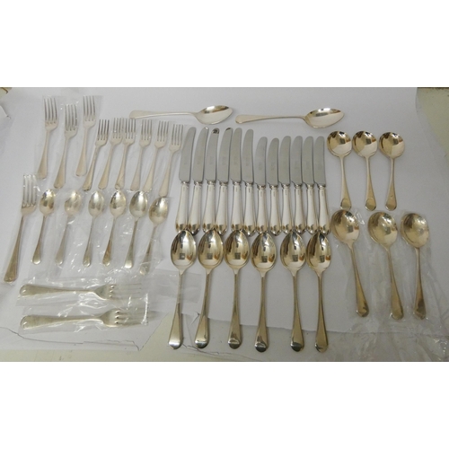 628 - A modern hallmarked silver canteen of old English pattern cutlery, unused and as new, by United Cutl... 