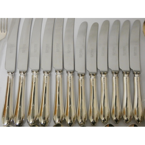 628 - A modern hallmarked silver canteen of old English pattern cutlery, unused and as new, by United Cutl... 