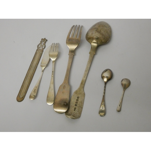 634 - An antique silver table spoon, various other silver spoons and small items. Gross weight 6.4 troy oz