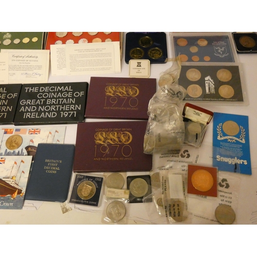 665 - An accumulation of proof sets, specimen sets,  commemorative crowns, odd coins etc