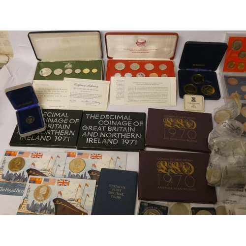 665 - An accumulation of proof sets, specimen sets,  commemorative crowns, odd coins etc