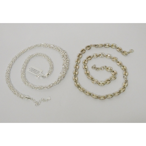 459 - A modern silver fancy woven link chain necklace and an anchor link silver necklace