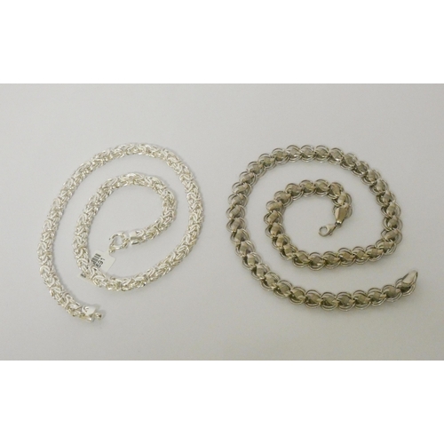 460 - Two wide modern silver fancy link neck chains each approx. 50cms long