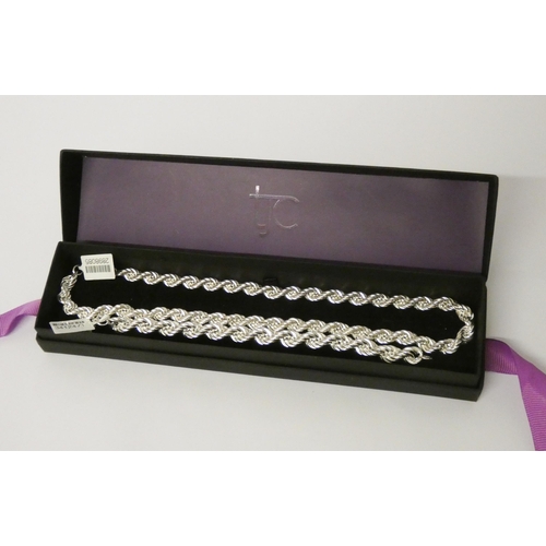 467 - A modern silver rope link necklace and matching bracelet, unworn with tags, 68gms