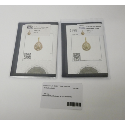 472 - A pair of matching diamond pendants each set 1ct of diamonds, as new, unworn with SGL certificates