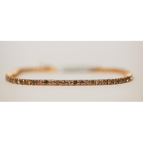 484 - Rhapsody champagne diamond line bracelet in 14ct rose gold, 5 carat total weight, 19.5cms long, 10gm... 